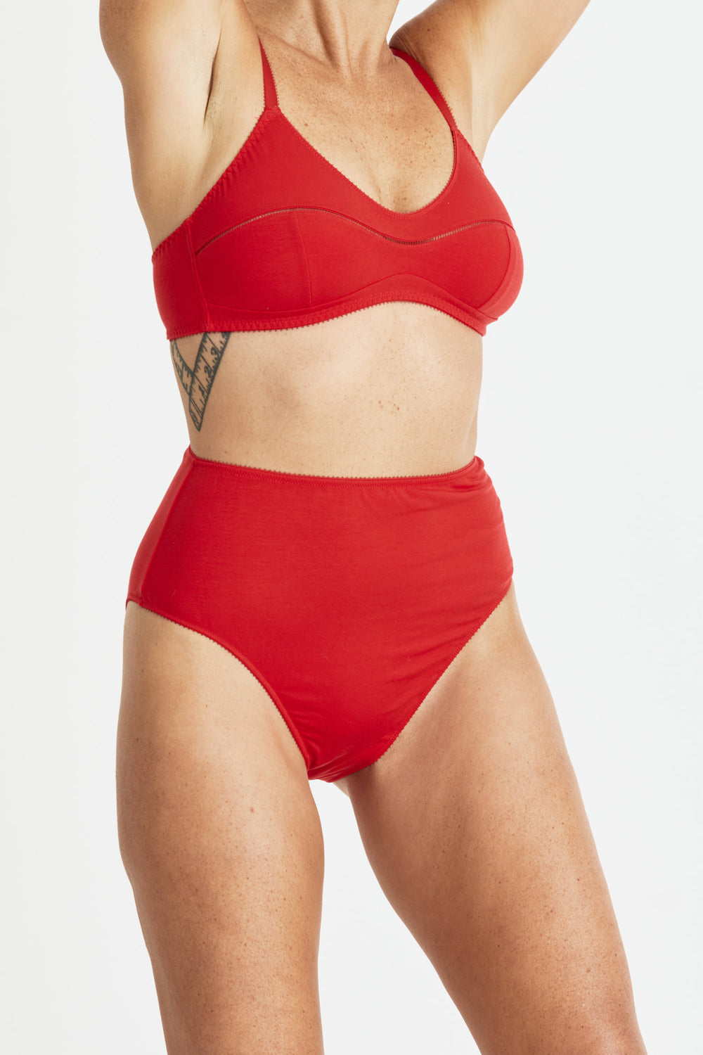 Videris Lingerie Maggie underwire free soft cup bra in red TENCEL™ with ladderstitch detail and scooped neckline