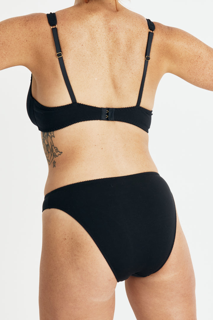 Videris Lingerie Sarah underwire free soft cup bra in black TENCEL™ features a seamed plunge cup and continous underarm