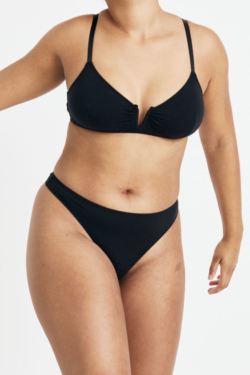 Videris Lingerie Angela underwire free soft cup bra in black TENCEL™ has a triangle shaped cup and front gathering detail